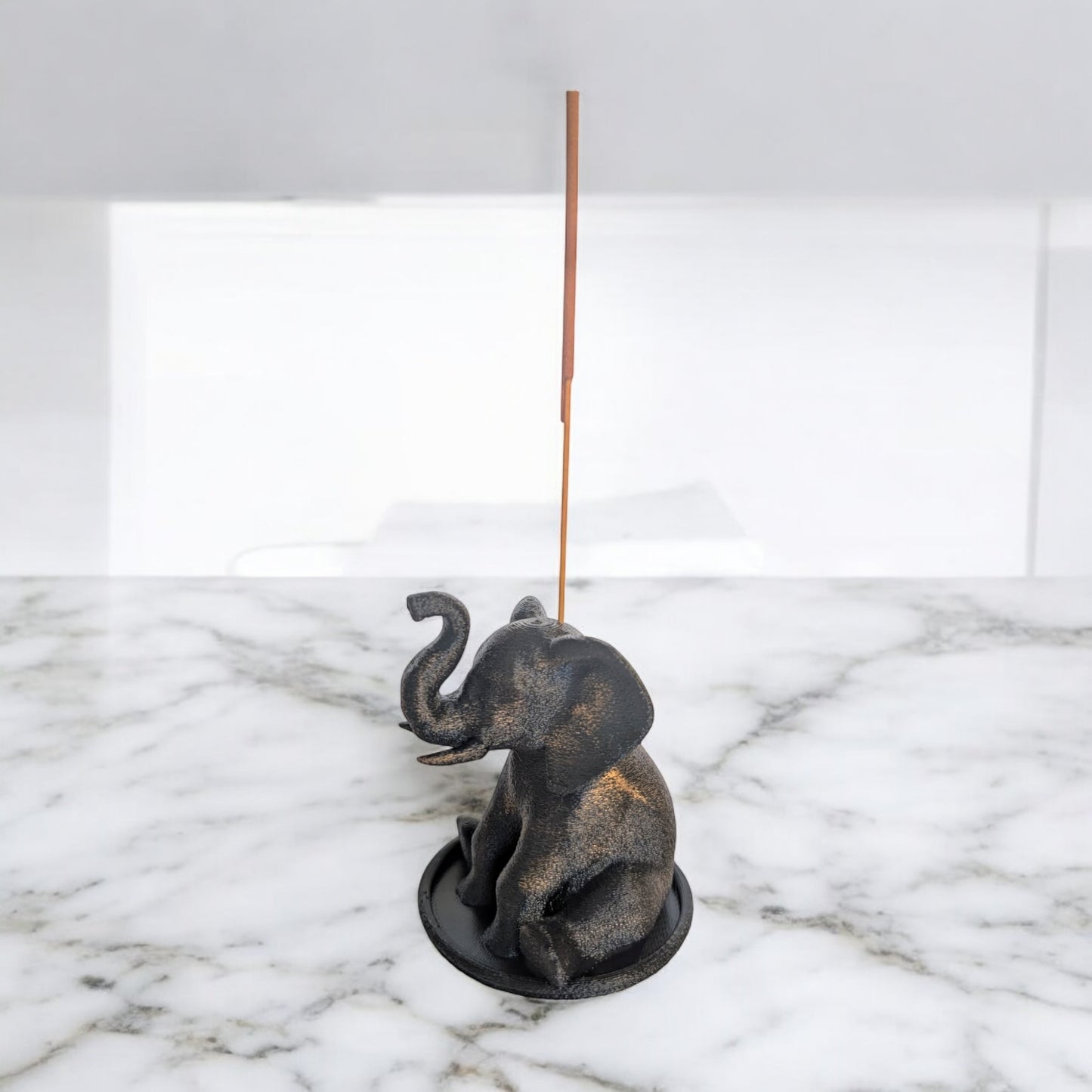 Incienso elefante sentado